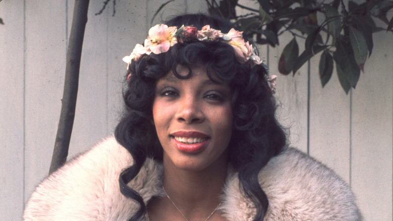 Donna Summer in fur coat and flower headdress in 1970s publicity photo