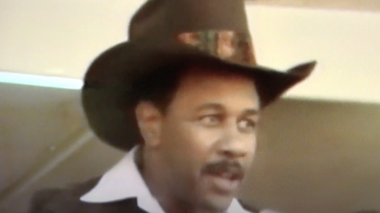 Willie Stargel wearing huge cowboy hat giving speech