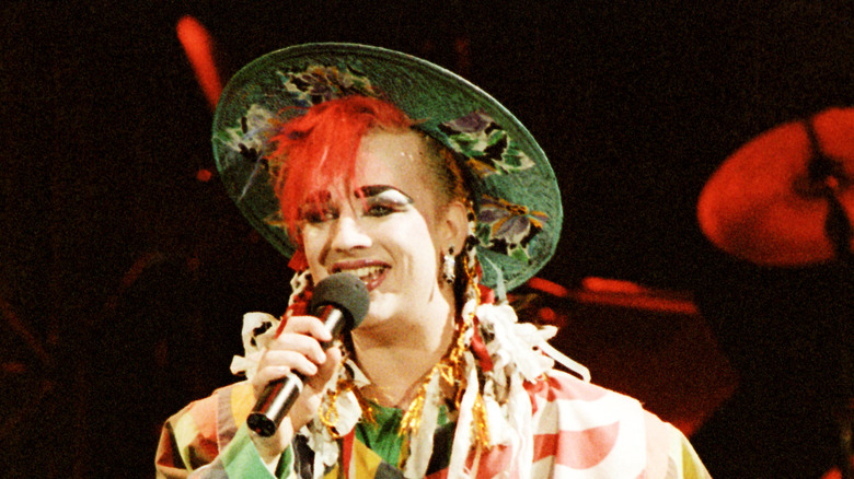 Boy George of Culture Club singing onstage in the mid-1980s