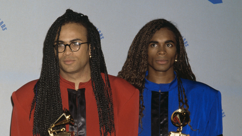 Milli Vanilli holding their Grammy Awards