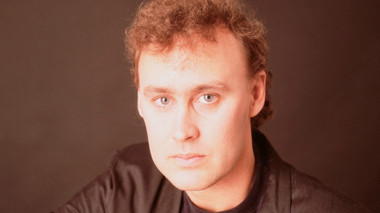 Bruce Hornsby sadly staring at camera
