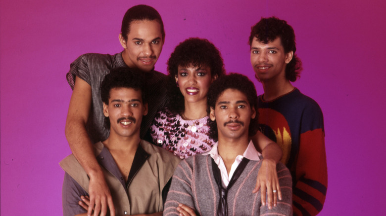DeBarge in publicity shot with purple background
