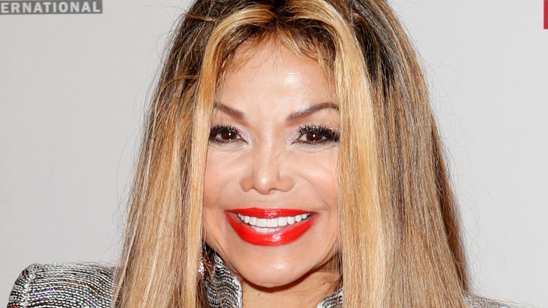 La Toya Jackson smiling at a red carpet event