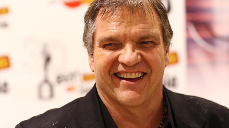 Meat Loaf smiling at a red carpet event