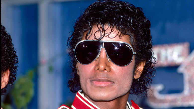 Michael Jackson in sunglasses and military jacket in 1983