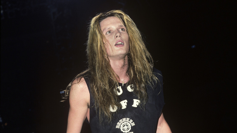 Sebastian Bach onstage in dark T-shirt in 1989