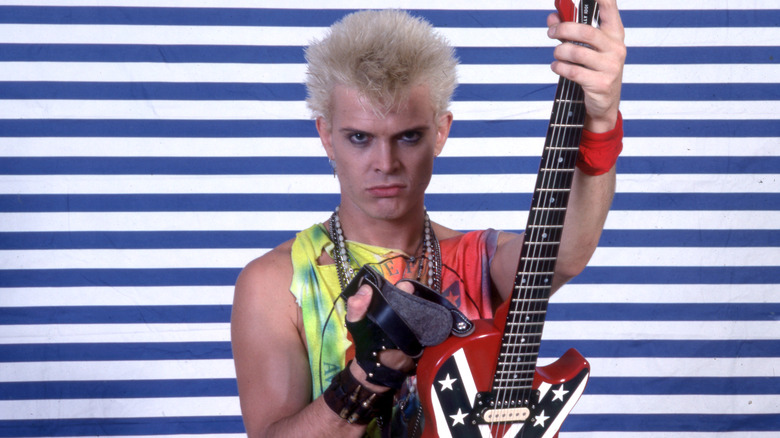 Billy Idol holding guitar in 1987