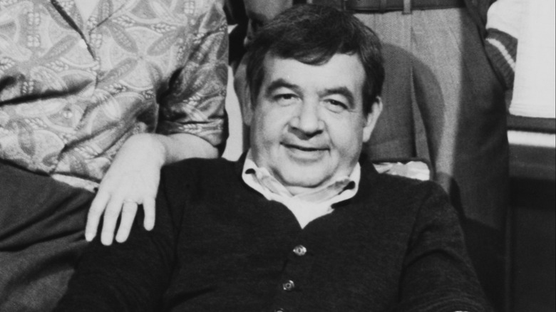 Howard Cunningham sitting in chair