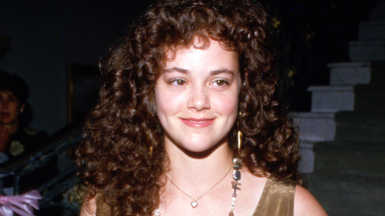 Rebecca Schaeffer smiling and looking to side