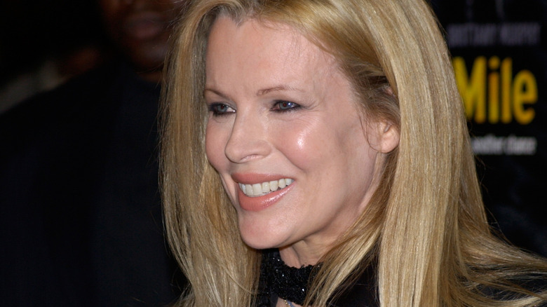 Kim Basinger smiling in 2002