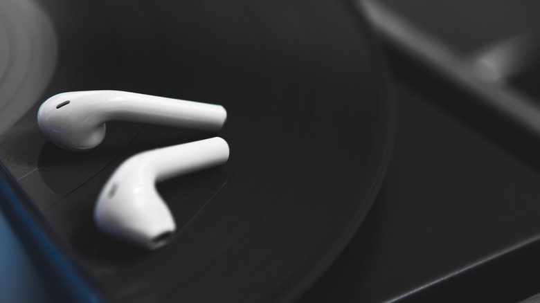 Earbuds on a vinyl record