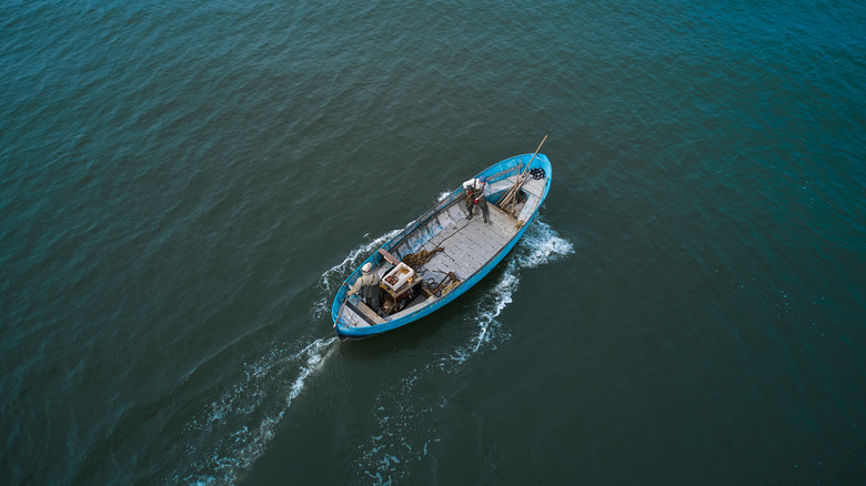 boat and men at sea