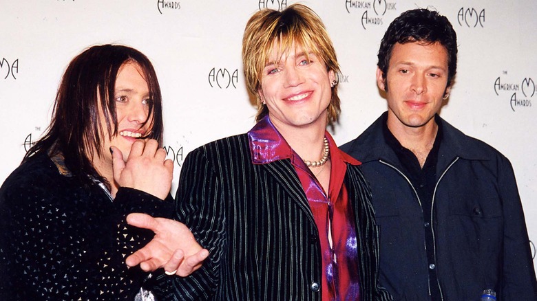 Goo Goo Dolls grinning wildly at American Music Awards