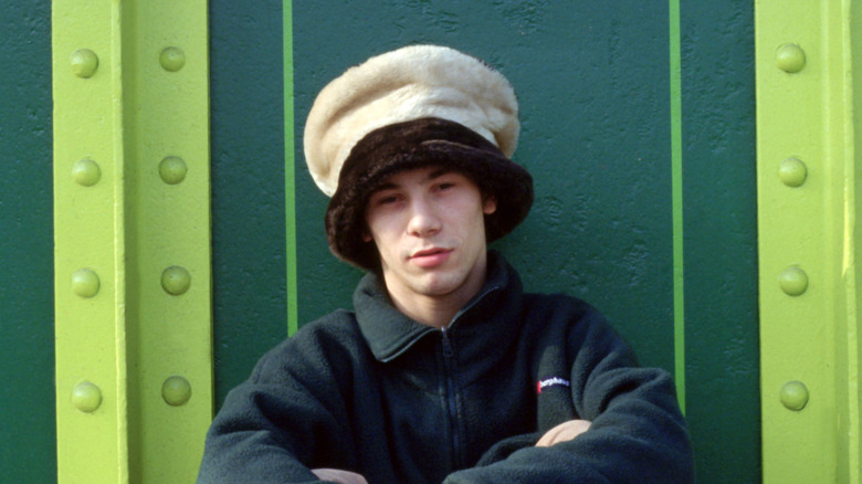 Jay Kay of Jamiroquai squints in big furry hat