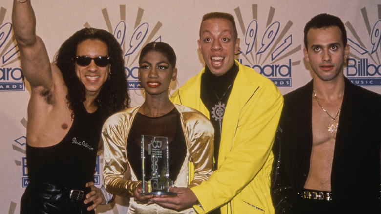 David Cole with C+C Music Factory holding award