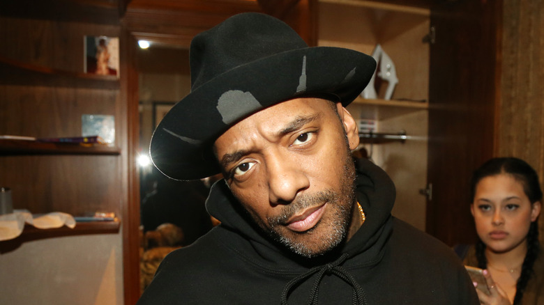 Prodigy in hat staring at camera