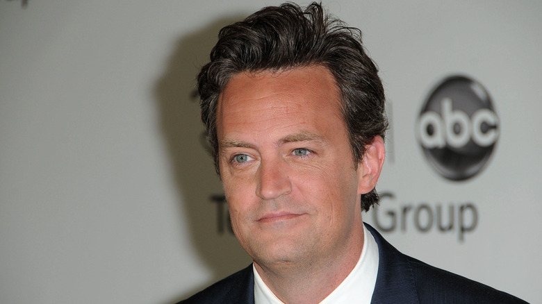 Matthew Perry spiked hair smiling