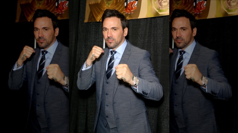 Jason David Frank raising his fist for a pose in 2019