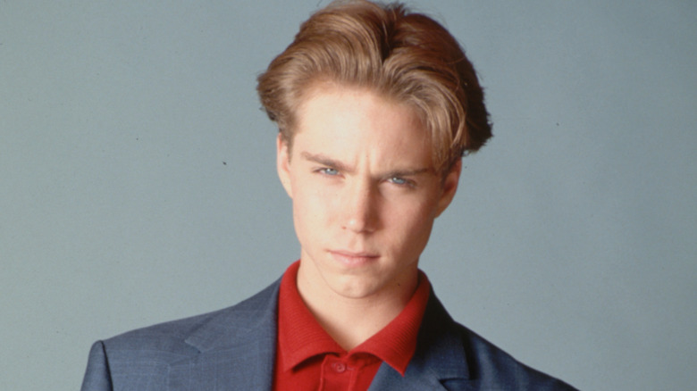 Jonathan Brandis posing for a photo