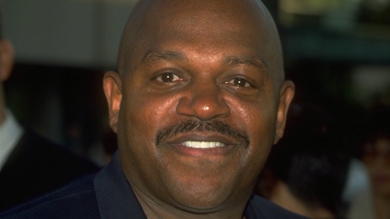 Charles S. Dutton biting lips in '90s