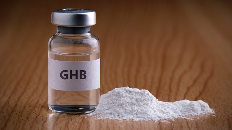 GHB vile and powder on table