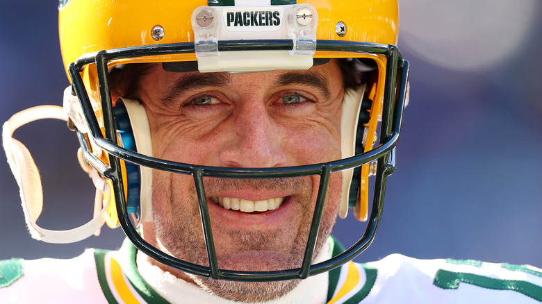 Aaron Rodgers smiling in helmet