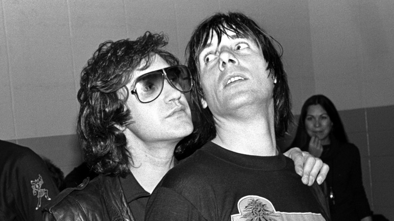 Dave Davies menacing Mick Avory