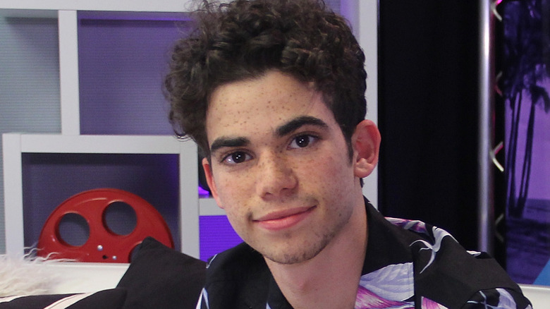 cameron boyce staring at camera