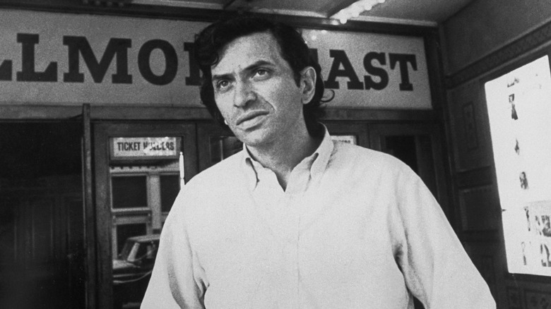 Bill Graham white shirt outside Fillmore East theater