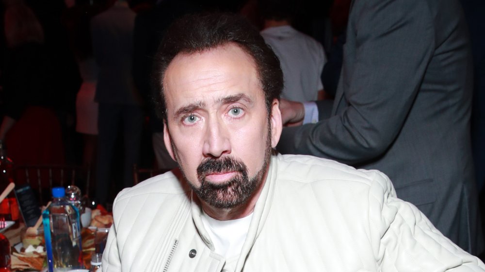 Nicolas Cage beard white jacket
