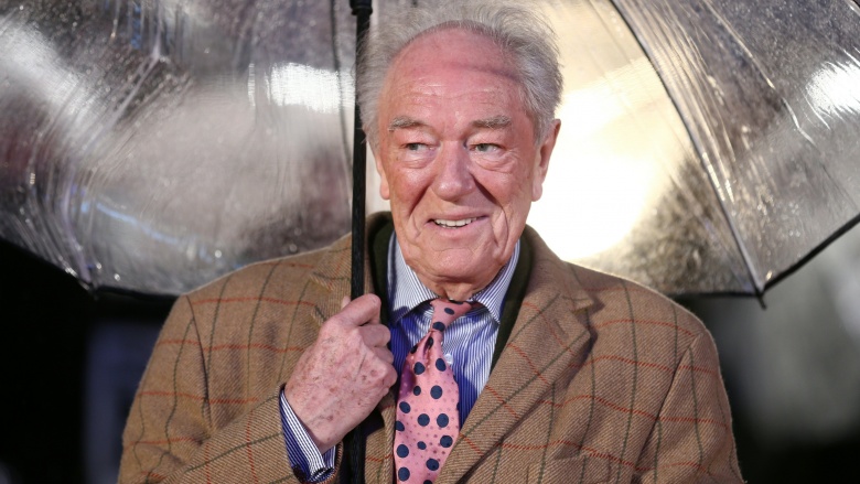 michael gambon holding umbrella