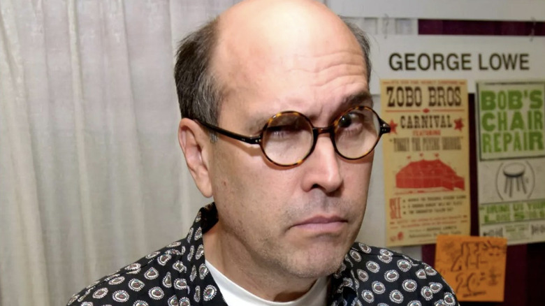 George Lowe in glasses making funny face