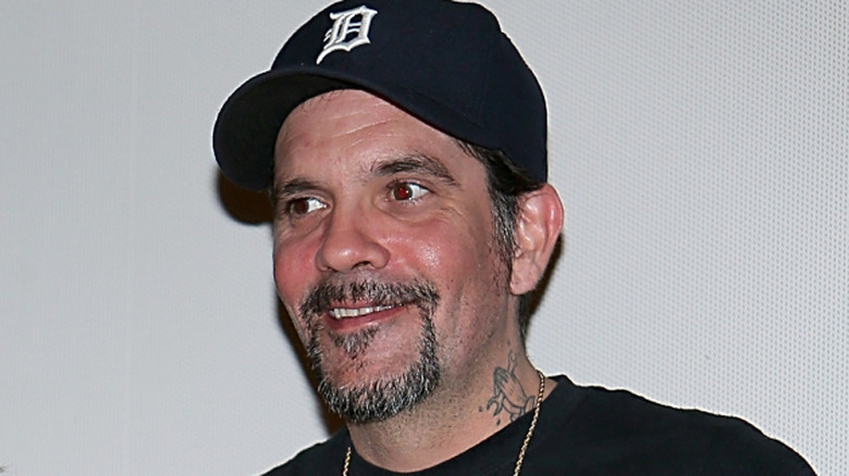 Nicky Katt smiling nervously in ballcap