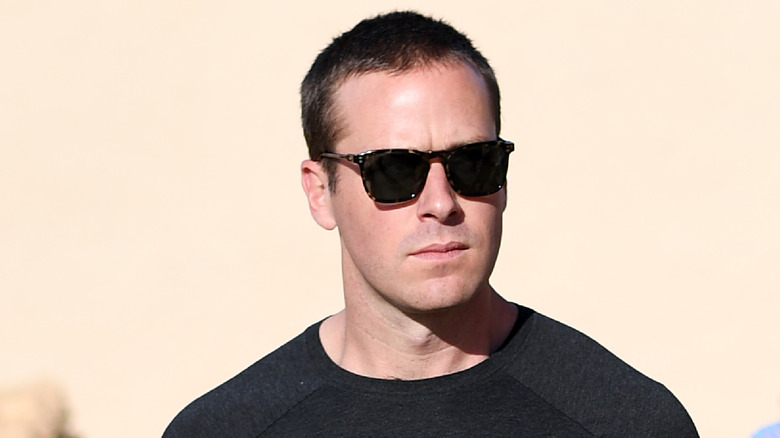 armie hammer looking serious sunglasses