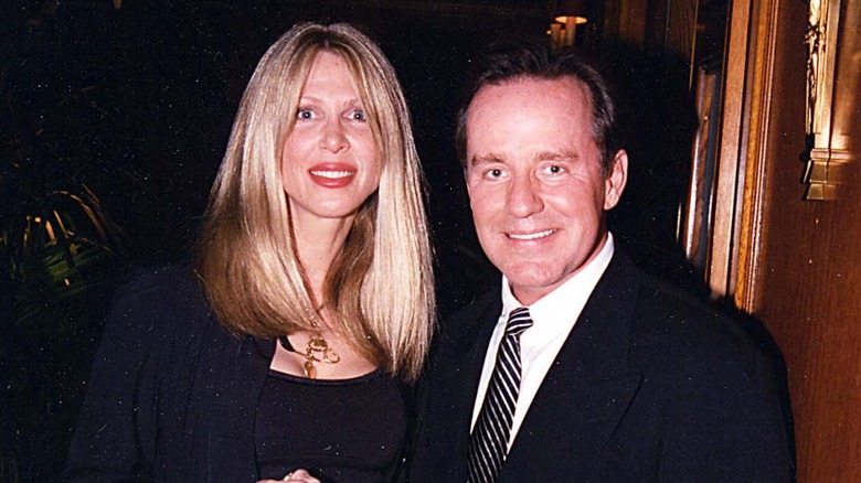 Phil Hartman and his wife smiling