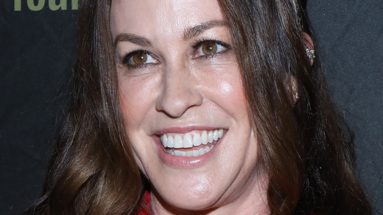 Alanis Morissette smiling, 2022