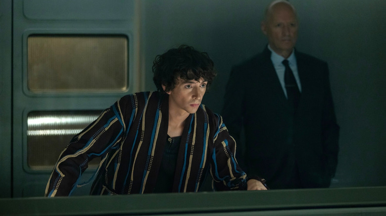 Samuel Blenkin's Boy Kavalier leaning over the console in Alien: Earth