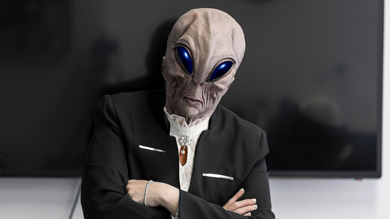 Alien at a board meeting