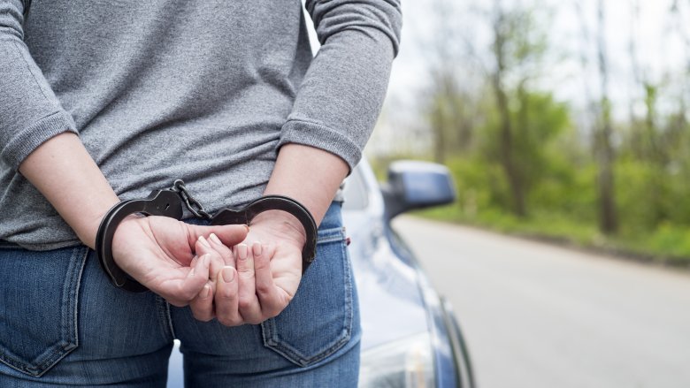 Woman in handcuffs