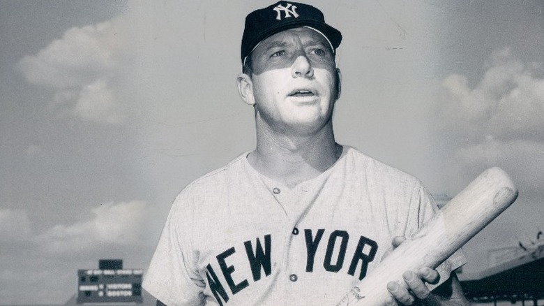 Mickey Mantle holding a bat