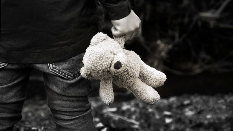 Child with teddy bear