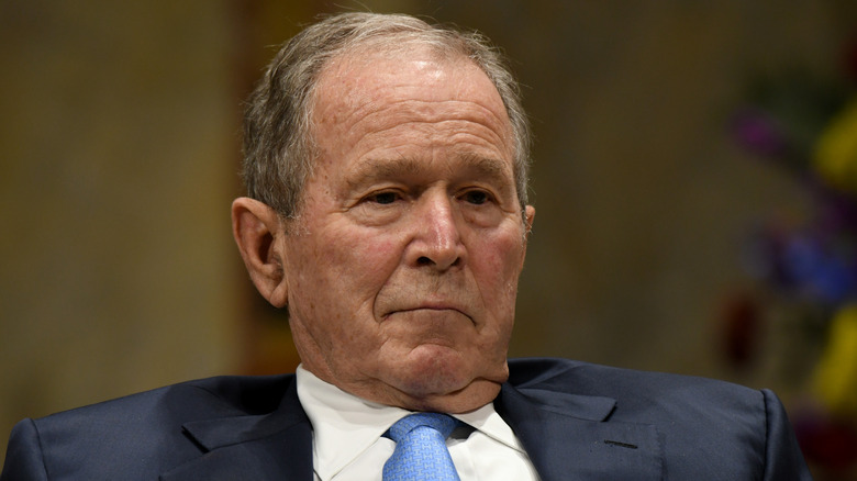 George Bush slouching