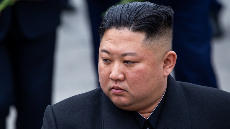 Kim Jong-un looking away