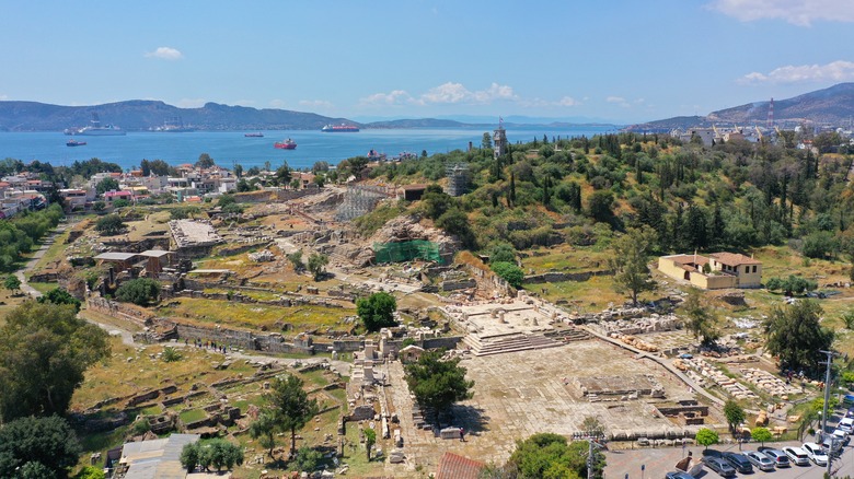 ruins eleusis green trees blue skies