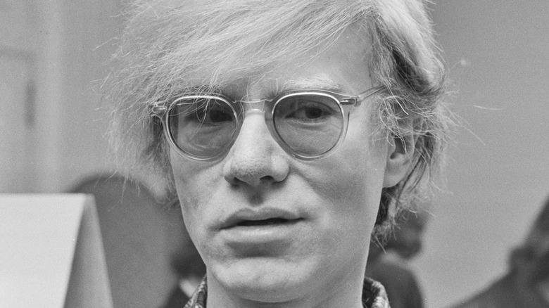Andy Warhol in tinted glasses