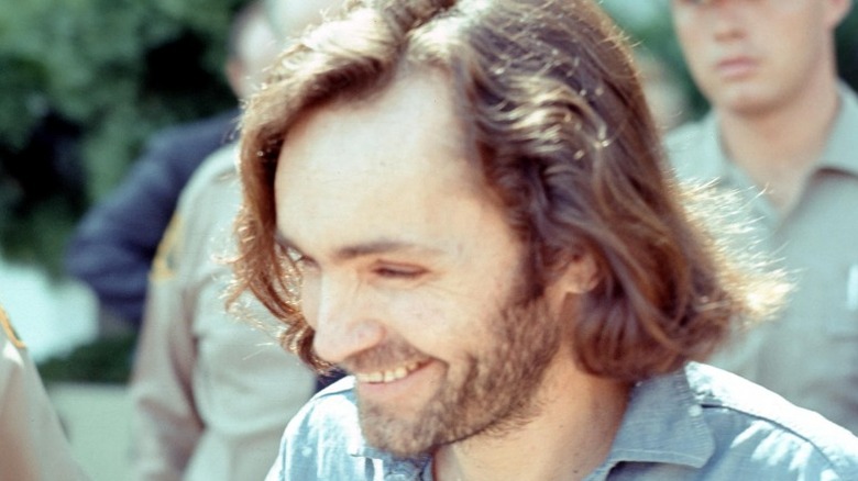 Charles Manson smiling