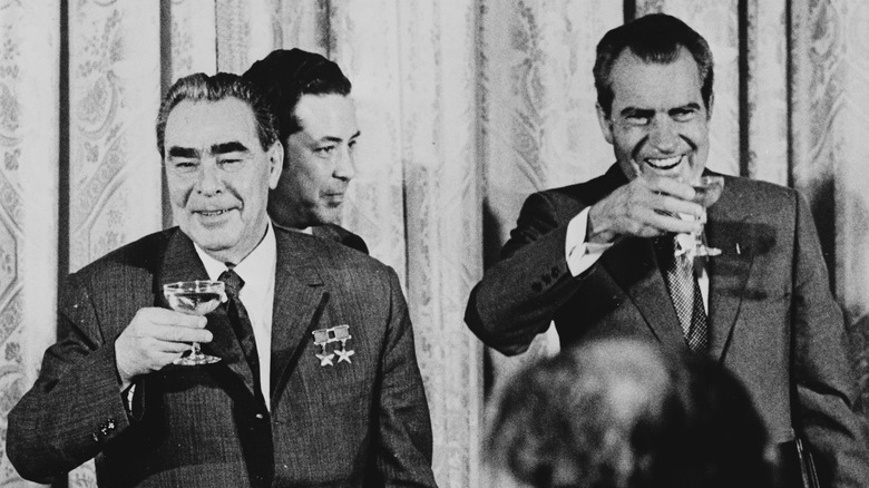 Richard Nixon drinking champagne with Breznev