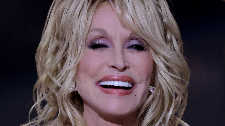 Dolly Parton smiling on stage