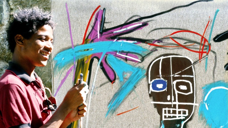 Artist Jean-Michel paints in 1983 in St. Moritz, Switzerland
