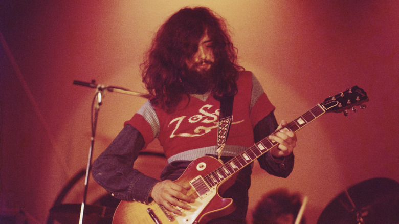 Led Zeppelin's Jimmy Page plays guitar in 1971